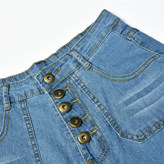 High waist slim jeans with button placket
