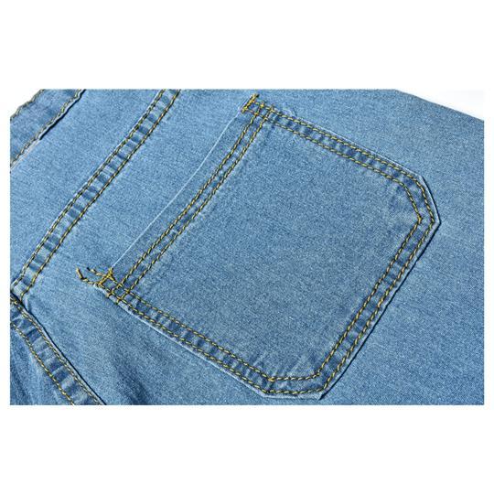 High waist slim jeans with button placket