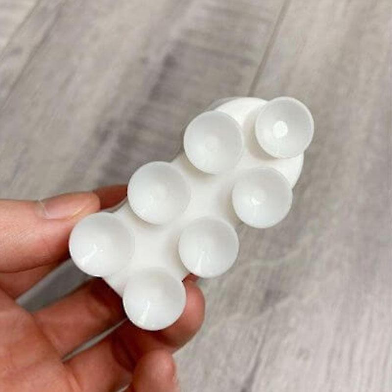 Silicone shower head holder