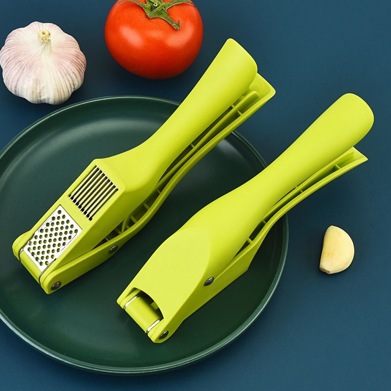 Portable garlic press