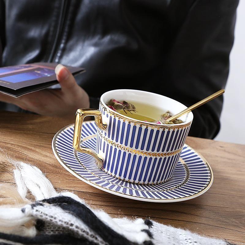 Coffee cups + plates + spoons