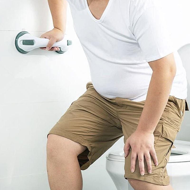 Bathroom handrail with suction cup handle