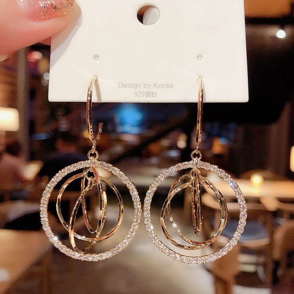 Geometric multi-layered round earrings
